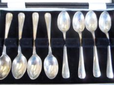 A set of eight silver coffee spoons, mm G B & S, Sheffield hallmark, dated 1963, in original