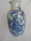 Chinese Blue and White Porcelain Vase, the vase having a hand painted frieze depicting a Zhongkui