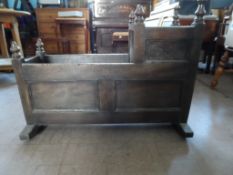Antique 17th Century Style Child`s Oak Rocking Cradle the cradle having plain panelled sides with