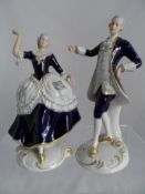 Royal Dux Figures depicting a classical lady and gentleman with stamps to base, made in