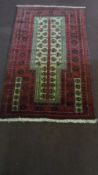 Nr 300 - A BALOCH TRIBAL PRAYER RUG, 144 X 90 cms.