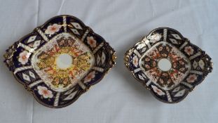 TWO ROYAL CROWN DERBY FOOTED DISHES, PATTERN NUMBER 2451, 26 X 23 cms AND 21 x 19 cms
