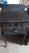 A PART CIRCA 17TH CENTURY WRITING DESK, THE DESK HAVING CARVED FRONT DATED 1700 INITIALLED S S