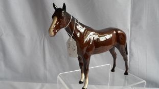 A ROYAL DOULTON PORCELAIN FIGURE DA52 - ARAB HORSE