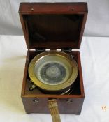 A WW II JAPANESE MARINE COMPASS, THE COMPASS HAVING AN IDENTITY PLAQUE NO. 164 18 12, APPROX.