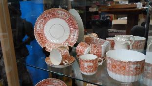 A VICTORIAN TERRACOTTA CHINESE STYLE PART DINNER SERVICE INCLUDING TWELVE TEA PLATES (ONE CRACKED),