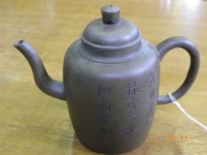 A CHINESE ZISHA EARLY 20th CENTURY TEAPOT, APPROX. 16 cms TALL CHARACTER MARKS TO BASE AND ONE SIDE