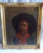 A 20TH CENTURY OIL ON CANVAS OF A BRIGAND, GILT WOOD FRAME. LABEL TO VERSO