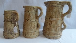 THREE GRADUATED HILLSTONIA POTTERY WATER JUGS 28, 24 AND 20 cms