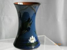 A TORQUAY POTTERY VASE DECORATED WITH A KINGFISHER