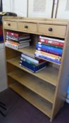 AN OPEN FRONTED PINE BOOKCASE HAVING THREE DRAWERS TO THE TOP, APPROX. 100 X 40 X 128 cms