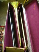 A BRASS TROMBONE BY SKYLARK MADE IN CHINA IN A CASE