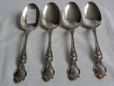 FOUR STERLING SILVER SHREVE & CO., SERVING SPOONS MAKER`S MARK RW&S HAVING A FLOWER DESIGN