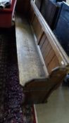 A LONG PINE CHURCH PEW, APPROX. 240 cms / 7.5ft IN LENGTH