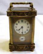 A 19th CENTURY FRENCH ORMULU CARRIAGE CLOCK WITH SUBSIDIARY DIAL, THE CARRIAGE CLOCK HAVING SHAPED