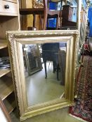 A PAIR OF VINTAGE WOOD AND PLASTER MIRRORS, APPROX. 76 X 104 cms