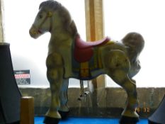 A VINTAGE MOBO METAL FIGURE OF MUFFIN THE MULE, THIS TOY HAS PEDALS