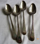 FOUR LONDON HALLMARKED SOLID SILVER SERVING SPOONS, MM L.L. APPROX. 240 gms