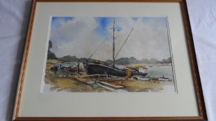 A FRAMED AND GLAZED ORIGINAL WATERCOLOUR OF A FISHING BOAT "PINMILL" SIGNED C W STUART, APPROX. 44 X