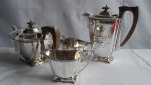 A SILVER PLATED COFFEE AND TEA SET COMPRISING A TEAPOT, SUGAR BOWL AND MILK/CREAM JUG AND A COFFEE