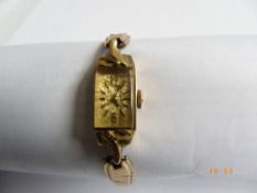 A LADY`S 18ct GOLD SHEFFIELD HALLMARKED CASED ( MM L A ) WRISTWATCH ENGRAVED SYREN TO MOVEMENT ON