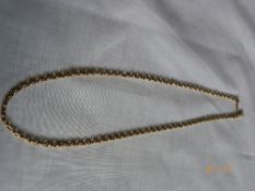 A 9 ct YELLOW GOLD CHAIN APPROX. 7.4 gm