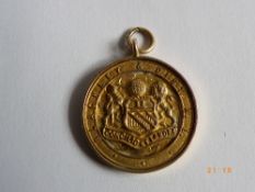 A 9 ct GOLD HALLMARKED MEDALLION, BLACKLEY & DISTRICT, A.L. STAMPED TATTORINI & SONS, BRADFORD