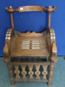 Antique Hardwood West African `Chieftain`s Chair`. The chair having arm rests in the form of birds