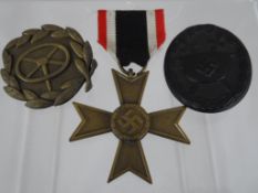 Three German Third Reich Period Wound Badges, also included are a driver qualification badge and a