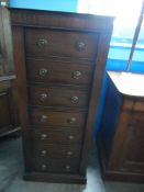 A Gun Cabinet. The cabinet being in the form of a mahogany Wellington chest. Approx. 60 x 33 x 140