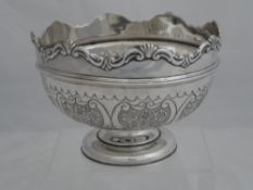 Solid silver rose bowl. The bowl with scalloped edges engraved with flowers. Sheffield hallmarked,