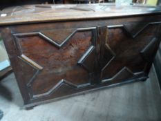 An Antique Oak Blanket Chest. The chest having panelled front, top and sides. Approx. 112 x 49 x