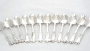 Solid silver Kings Pattern Dessert Spoons. Twelve solid silver Kings Pattern Dessert Spoons.
