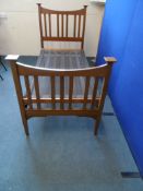 An Edwardian Mahogany Bed. The bed having slatted head and tail ends and a sprung base. Approx. 97 x