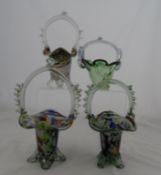 Four Murano style multi coloured glass baskets