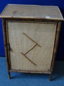 An Antique Cane and Bamboo Cupboard, The cupboard having two shelves to the interior. Approx. 62 x