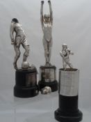 Three silver plated Sporting Trophies. The Sporting trophies include swimming, boxing and football