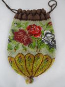 A Vintage Circa 1890 Hand Beaded Evening Bag, the bag depicting roses.