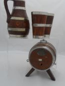 Four piece Coopered Oak Regimental Drinks Set. The set consisting of an ale flagon, costrel and
