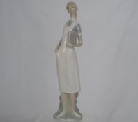 A Lladro Retired Figure " Nurse ", ( No box or number )