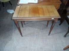 An Edwardian Hall Table. The table being pitch pine on turned tapered legs. Approx. 86 x 43 x 72