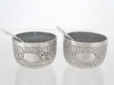 A pair of solid silver Salts. A pair of Victorian solid silver salts embellished with birds and