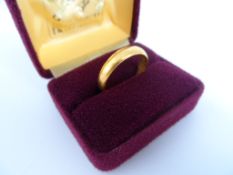 A Gent`s Gold Wedding Band, Birmingham hallmarked 22 ct, makers mark S.H. 6 grams, size W.