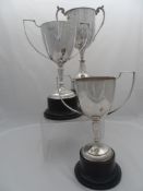 Three silver plated Regimental Sporting Trophies. The large twin handled trophies relate to