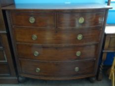 A Victorian Bow Fronted Chest Of Drawers. The chest having two short and three long drawers and