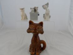 A collection of misc. porcelain cats incl. Beswick, Lladro, Nao and Devon ware (4)