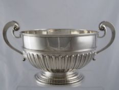 Solid silver Punch Bowl. The large scroll handled Punch bowl having plain top with ribbed bowl on
