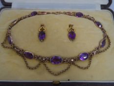 Amethyst Necklace and Earrings, A vintage 9 ct hallmarked gold and amethyst set, the necklace having