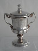 Solid silver Regimental Rugby Trophy. The twin handled, lidded trophy inscribed ‘Cawnpore India