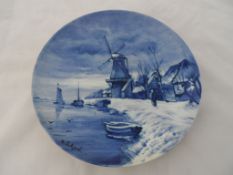 Blue and White Delft Plates, the cabinet plates depicting fishing boats at sea and windmills on